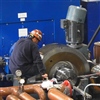 industrial gearbox repair specialist working